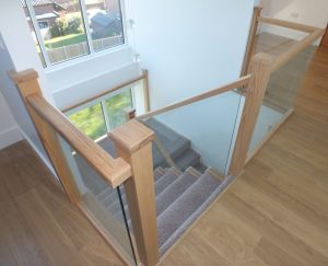 hardwood glass staircase with carpet