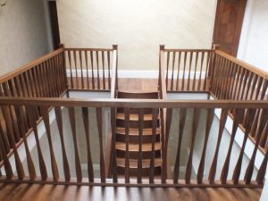 twin curved staircase, curved treads, modern spindles