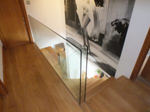 open plan, central spine staircase, free standing glass