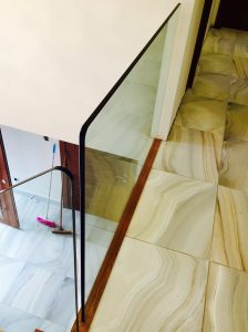 central spine staircase, free standing glass,