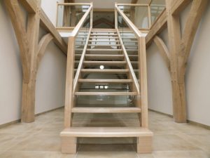 open plan glass staircase in barn conversion