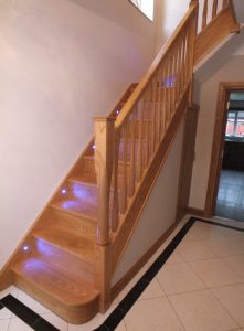 modern ash staircase with lights