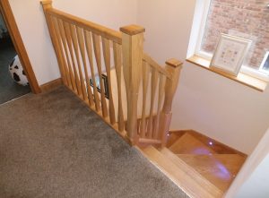 modern ash staircase with lights